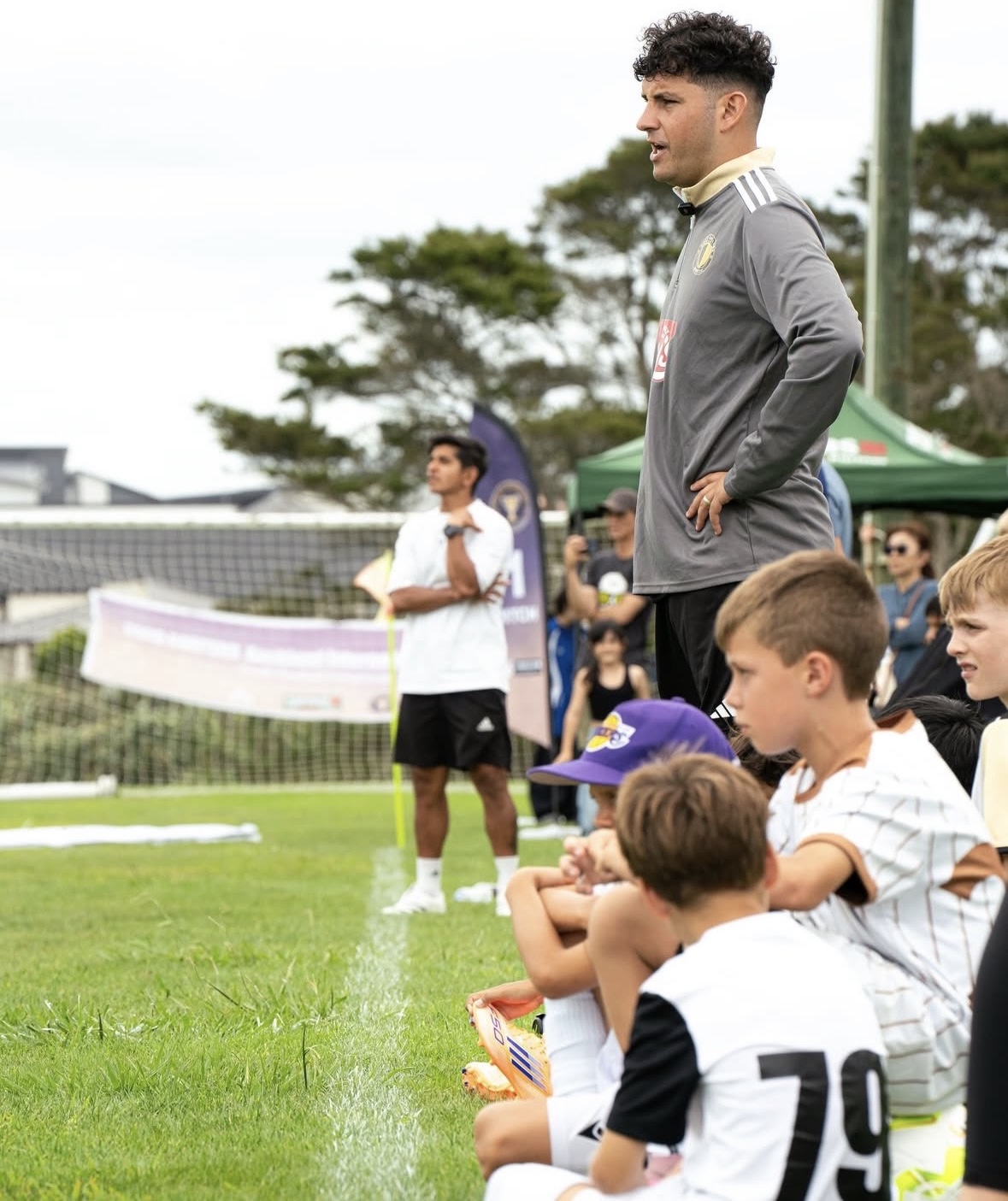 Daniel Semp watching match from the sideline